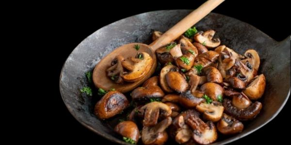 Spread mushrooms on a baking sheet